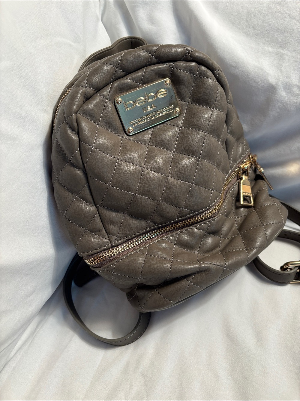 bebe Quilted Mini Backpack in Taupe Gray with Gold Hardware